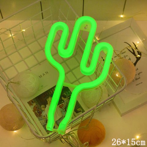 Unique LED night light shaped like a cactus in vibrant green for a fun home decor