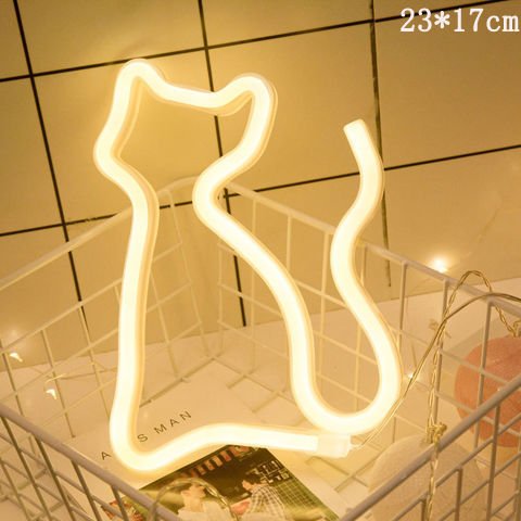 Unique LED night light shaped like a cat in a decorative setting, perfect for home decor